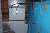 Existing AHU located in a small roof void